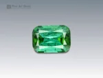 A 7.65 carat cushion-cut green tourmaline from Afghanistan with vivid color and brilliance, ideal for fine jewelry.