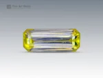 1.05 carat emerald-cut yellow stibiotantalite gemstone from Afghanistan.