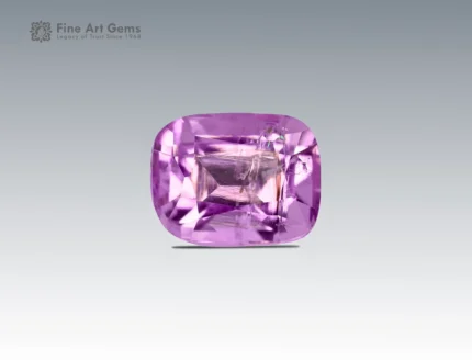 Cushion-cut pink topaz gemstone weighing 1.10 carats from Pakistan, with delicate pastel pink color and fine clarity.