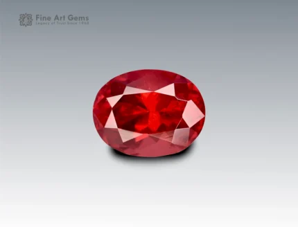 Brilliant 1.35 carat oval cut rhodolite garnet with intense red-pink color, sourced from Africa. Perfect for jewelry lovers and gemstone collectors.