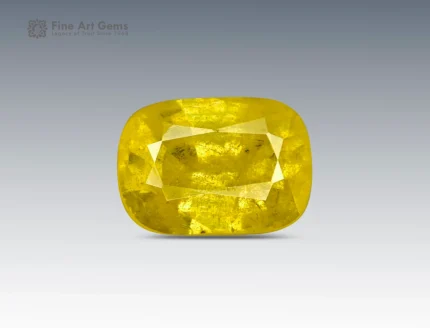 Cushion brilliant-cut golden-yellow stibiotantalite gemstone weighing 1.50 carats from Afghanistan, with warm color and natural inclusions.