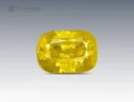 Cushion brilliant-cut golden-yellow stibiotantalite gemstone weighing 1.50 carats from Afghanistan, with warm color and natural inclusions.
