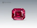 Emerald-cut deep purplish-pink rhodolite garnet weighing 1.70 carats from Africa, with vibrant saturation and fine clarity.
