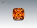 Brilliant 1.9 carat cushion cut sphene (titanite) gemstone from Pakistan with fiery golden-orange brilliance and exceptional dispersion.