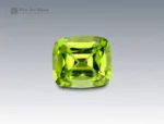 Brilliant 2.1 carat cushion cut peridot gemstone in vivid lime-green, ethically sourced from Pakistan. Ideal for custom jewelry and gemstone collectors.