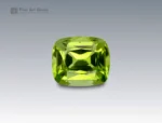 Cushion-cut bright green peridot gemstone weighing 2.15 carats from Pakistan, with fine clarity and vibrant color.