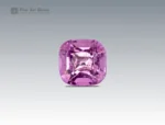 A 2.3-carat cushion-cut pink topaz with a bright rosy hue and sparkling facets, mined in Pakistan.