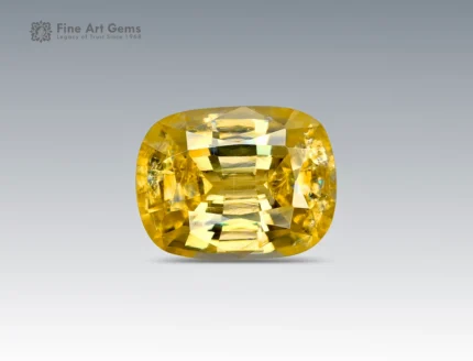 Cushion brilliant-cut golden-yellow stibiotantalite gemstone weighing 2.80 carats from Afghanistan, with vibrant color and fine brilliance.