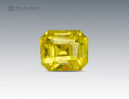 0.15 carat emerald-cut yellow stibiotantalite gemstone from Afghanistan.
