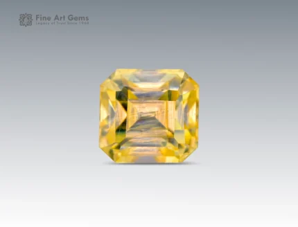 0.25 carat emerald-cut yellow stibiotantalite gemstone from Afghanistan.