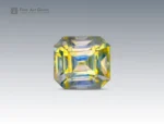 0.35 carat emerald-cut yellow stibiotantalite gemstone from Afghanistan.