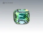 Cushion-cut blue-green tourmaline gemstone weighing 2.02 carats from Afghanistan, with mixed tones and fine brilliance.