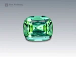 Cushion-cut green tourmaline gemstone weighing 2.25 carats from Afghanistan, with mixed green tones and fine brilliance.