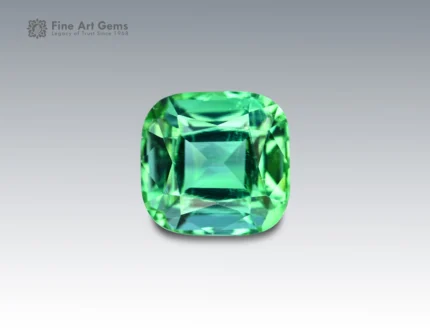 Cushion-cut bright green tourmaline gemstone weighing 2.65 carats from Afghanistan, with vivid color and fine brilliance.