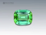 Cushion-cut green tourmaline gemstone weighing 2.85 carats from Afghanistan, with vibrant color zoning and fine clarity.