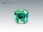 Cushion-cut bluish-green tourmaline gemstone weighing 2.90 carats from Afghanistan, with vivid color zoning and fine clarity.