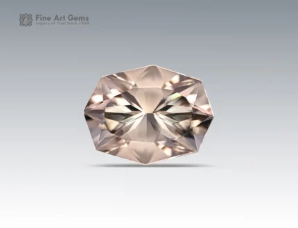 A 9.40-carat topaz with a custom fancy cut, showing a soft champagne color and brilliant sparkle, mined in Pakistan.