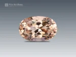 A 7.20-carat oval-shaped topaz with a soft golden-brown color, mined in Pakistan.