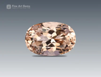 A 7.20-carat oval-shaped topaz with a soft golden-brown color, mined in Pakistan.