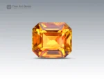 Emerald-cut golden-yellow sphene gemstone weighing 3.30 carats from Pakistan, showcasing vivid brilliance and exceptional clarity.