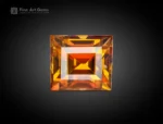 Natural 1.65 carat sphene (titanite) gemstone with princess cut from Pakistan, showing golden-yellow brilliance and fire