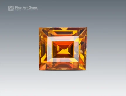 Natural 1.65 carat sphene (titanite) gemstone with princess cut from Pakistan, showing golden-yellow brilliance and fire