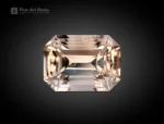 Magnificent 10.55 carat emerald-cut topaz from Pakistan, showcasing a delicate champagne hue with sharp step facets and radiant brilliance.