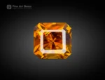 Natural 1.65ct golden-yellow sphene emerald cut from Pakistan, ideal for rings, pendants, earrings, and gemstone collections.