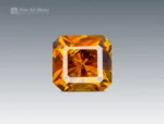 Natural 1.65ct golden-yellow sphene emerald cut from Pakistan, ideal for rings, pendants, earrings, and gemstone collections.