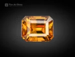 Emerald-cut 1.90 carat golden sphene (titanite) gemstone with bright luster, ideal for jewelry and gemstone collections.