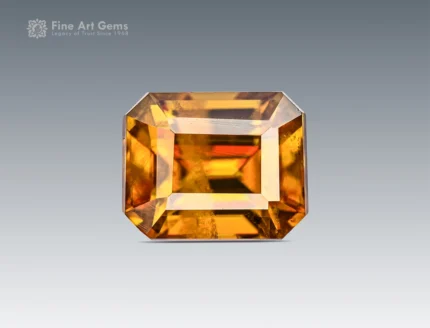 Emerald-cut 1.90 carat golden sphene (titanite) gemstone with bright luster, ideal for jewelry and gemstone collections.