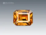Emerald-cut 1.90 carat golden sphene (titanite) gemstone with bright luster, ideal for jewelry and gemstone collections.