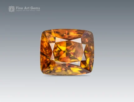 3.45 carat cushion cut sphene (titanite) gemstone from Pakistan, known for brilliance and fire, perfect for rings, pendants, and fine jewelry