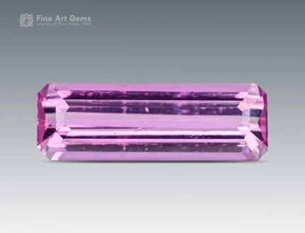 0.95 ct pink topaz gemstone with emerald cut from Pakistan, suitable for a delicate ring or pendant.