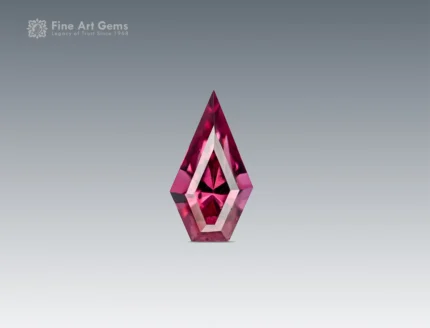 Vivid 01 carat kite cut rhodolite garnet from Africa. Ideal for unique jewelry settings and gemstone collections.