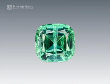 Natural 2.75 carat tourmaline gemstone in cushion cut, sourced from Afghanistan, showing a vivid green color perfect for rings, pendants, and jewelry.