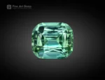 Natural 3.20 carat tourmaline gemstone in cushion cut, sourced from Afghanistan, showing a vivid green color perfect for rings, pendants, and jewelry.