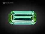 Cushion-cut green tourmaline gemstone from Afghanistan, showing vivid color and fine clarit