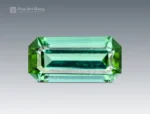 Cushion-cut green tourmaline gemstone from Afghanistan, showing vivid color and fine clarit