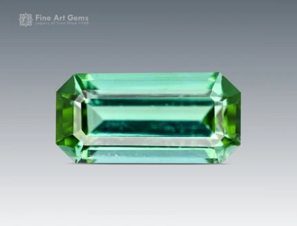 Cushion-cut green tourmaline gemstone from Afghanistan, showing vivid color and fine clarit