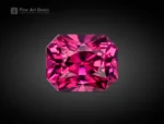 Fine 1.35 carat rhodolite garnet gemstone with vivid purplish-red color and cushion cut from Africa.