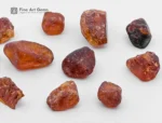 Fine rough bastnaesite crystal displaying reddish-brown color and natural luster from Pakistan.