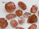 Fine rough golden topaz crystals from Pakistan. Showing warm amber color and natural brilliance.