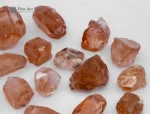 Fine rough golden topaz crystals from Pakistan. Showing warm amber color and natural brilliance.
