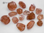 Fine rough golden topaz crystals from Pakistan. Showing warm amber color and natural brilliance.
