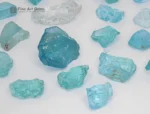 Fine rough aquamarine crystals from Madagascar show bright blue-green color and natural luster.