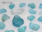 Fine rough aquamarine crystals from Madagascar show bright blue-green color and natural luster.