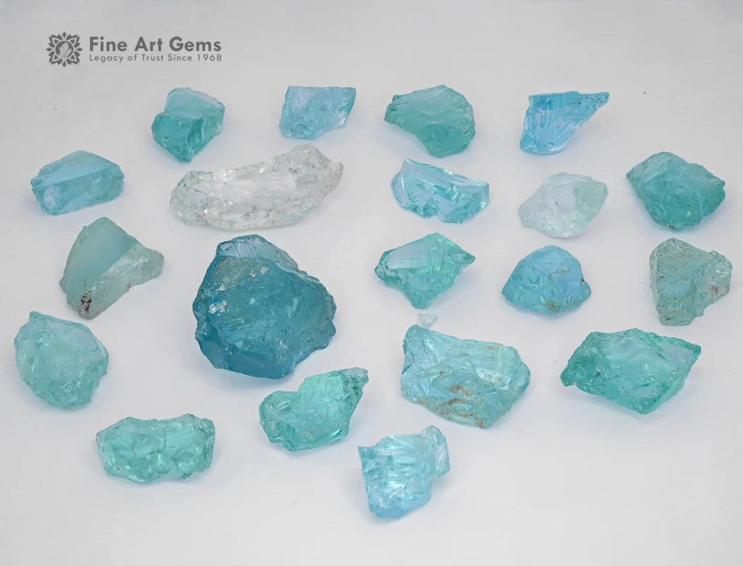 Fine rough aquamarine crystals from Madagascar show bright blue-green color and natural luster.