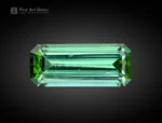 Elegant 1.90 carat green tourmaline gemstone with bright green hue and emerald cut from Afghanistan.