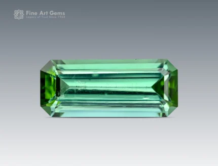 Elegant 1.90 carat green tourmaline gemstone with bright green hue and emerald cut from Afghanistan.